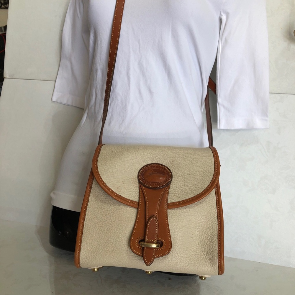 Dooney and Bourke AllWeatherLeather Vintage Essex handbag Ivory with Tan accents